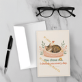 Adoption pet greeting card displayed with envelope